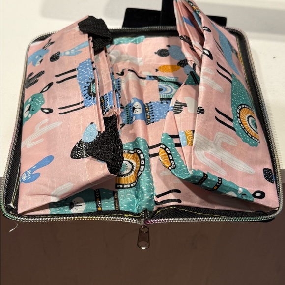 Llama Print zip up that turns into a reusable bag. Pink and Green - Picture 2 of 3